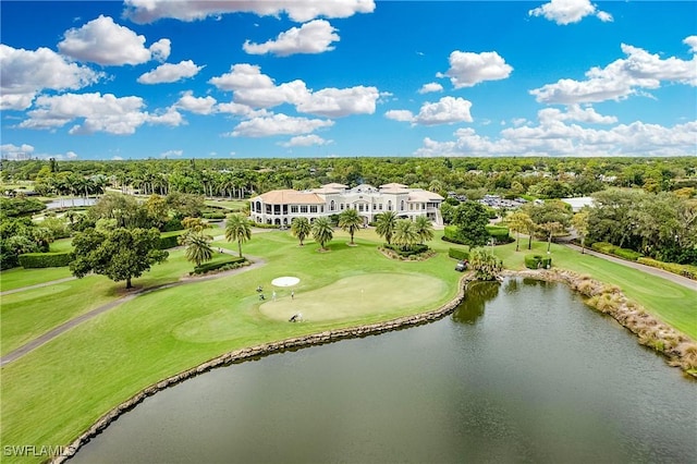 bird's eye view with view of golf course and a water view