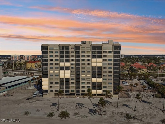 view of outdoor building at dusk