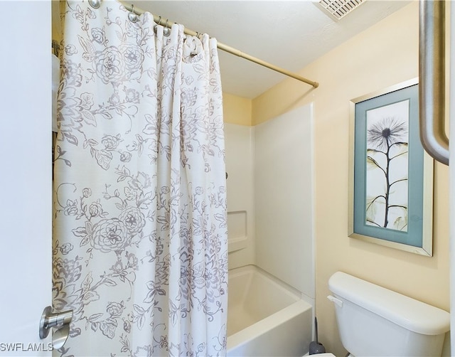 bathroom with toilet and shower / bathtub combination with curtain