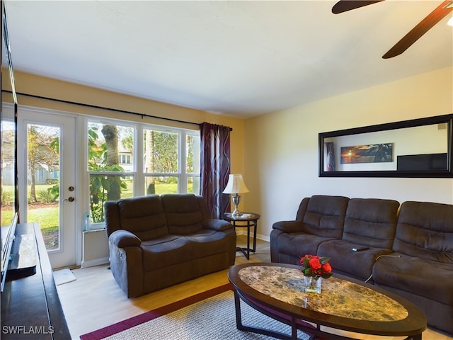 living room with light hardwood / wood-style flooring