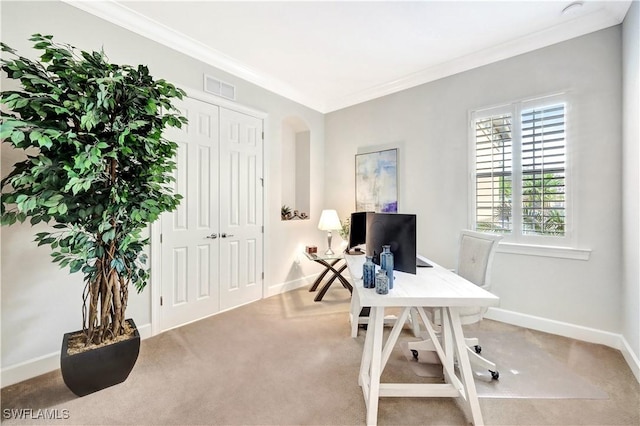 home office featuring ornamental molding and light carpet