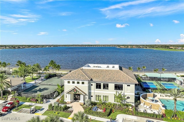 exterior space with a water view