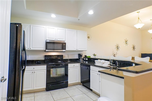 kitchen featuring white cabinetry, kitchen peninsula, dark stone countertops, light tile patterned floors, and black appliances