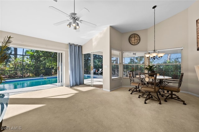 interior space featuring carpet flooring and ceiling fan