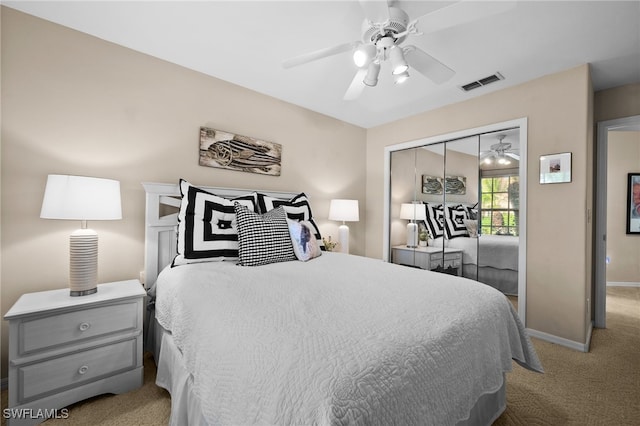 bedroom with ceiling fan, a closet, and carpet floors