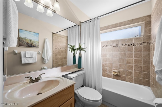 full bathroom featuring vanity, toilet, and shower / bathtub combination with curtain