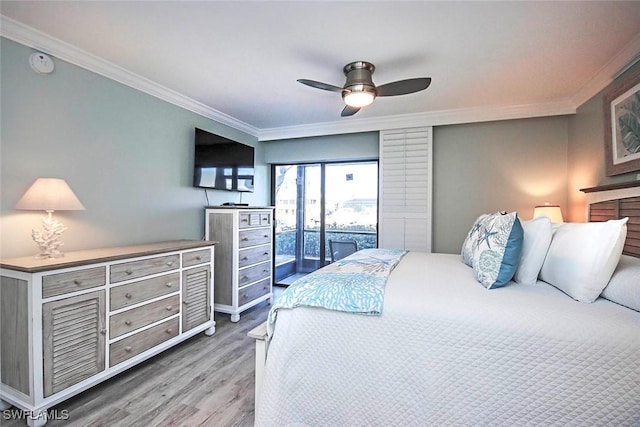 bedroom featuring ceiling fan, crown molding, and access to outside