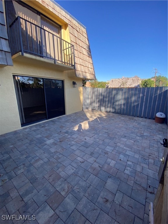 view of patio / terrace with a balcony