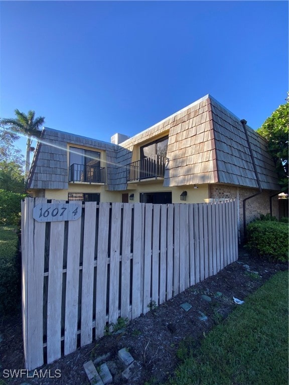 view of home's exterior featuring a balcony