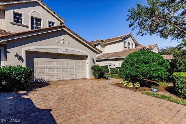 view of front of home with a garage