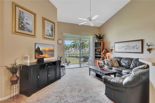 living room with carpet flooring, ceiling fan, and high vaulted ceiling