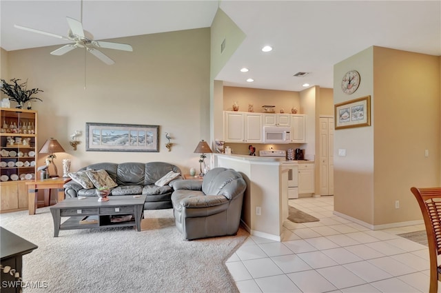 tiled living room featuring ceiling fan