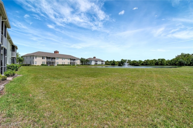 view of yard with a water view