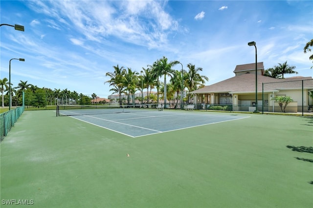 view of tennis court with basketball court