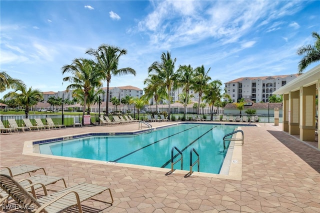 view of swimming pool featuring a patio