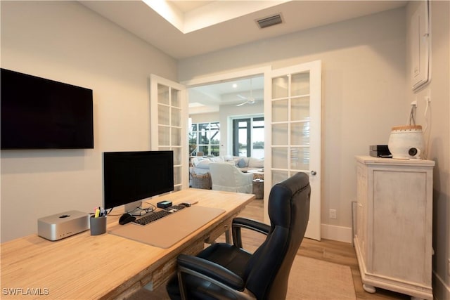 14248 Laguna Springs Ln, Naples, FL 34114 - office space with light wood-type flooring, baseboards, and french doors