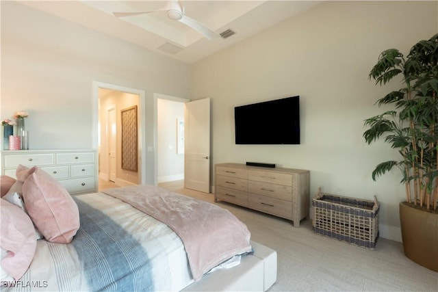 14248 Laguna Springs Ln, Naples, FL 34114 - bedroom featuring light colored carpet, vaulted ceiling, connected bathroom, and ceiling fan