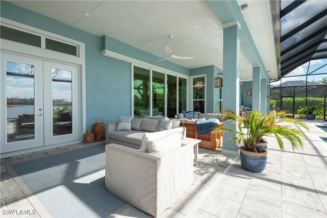 14248 Laguna Springs Ln, Naples, FL 34114 - view of patio / terrace with french doors, an outdoor living space, ceiling fan, and glass enclosure