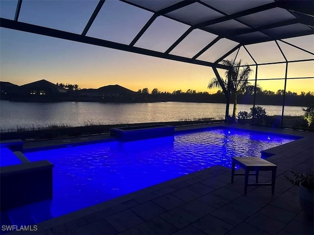14248 Laguna Springs Ln, Naples, FL 34114 - view of pool with a patio, a water view, a pool with connected hot tub, and a lanai