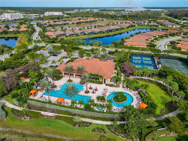 bird's eye view with a water view