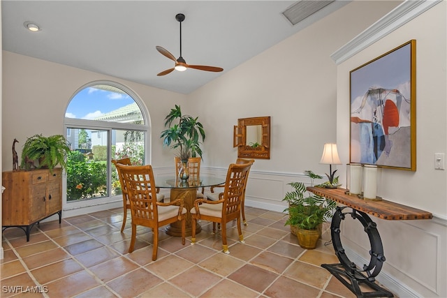 dining room featuring ceiling fan and high vaulted ceiling