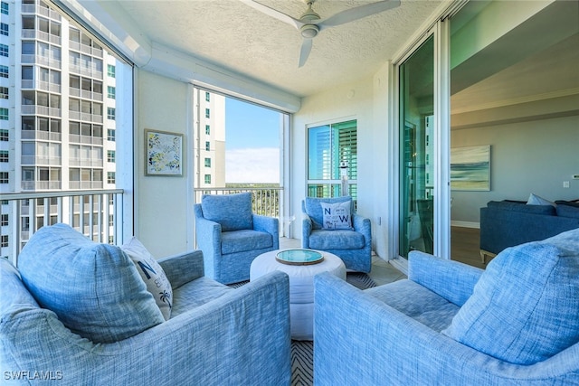 balcony featuring ceiling fan