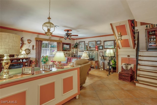 tiled living room featuring ceiling fan and crown molding