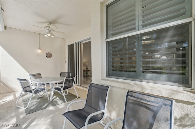 view of patio / terrace featuring ceiling fan