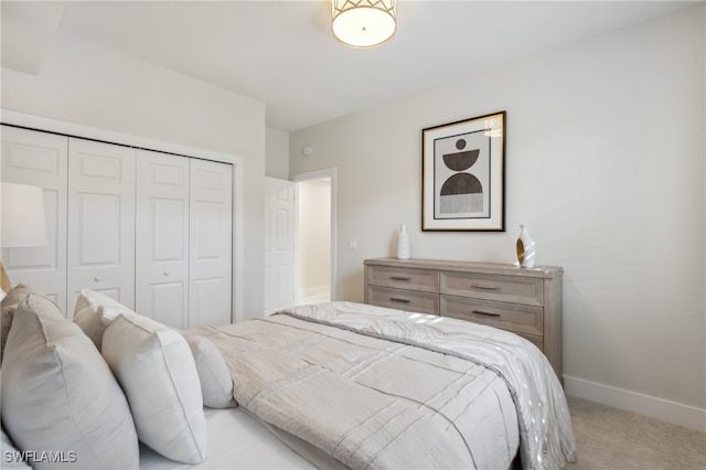 carpeted bedroom with a closet