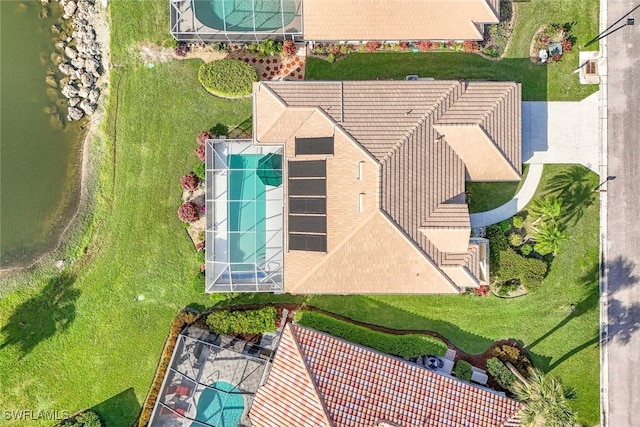 drone / aerial view with a water view