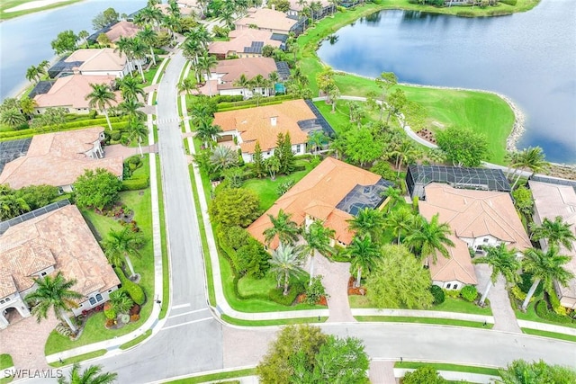 drone / aerial view with a water view