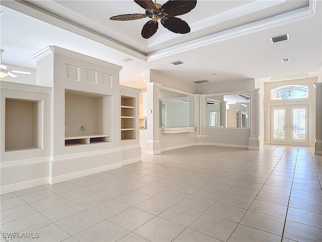 unfurnished living room with french doors, ornamental molding, built in shelves, ceiling fan, and light tile patterned flooring