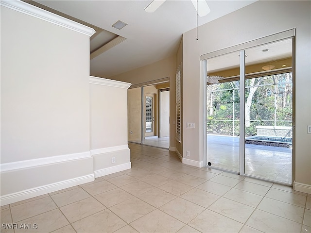 unfurnished room featuring ceiling fan and light tile patterned floors