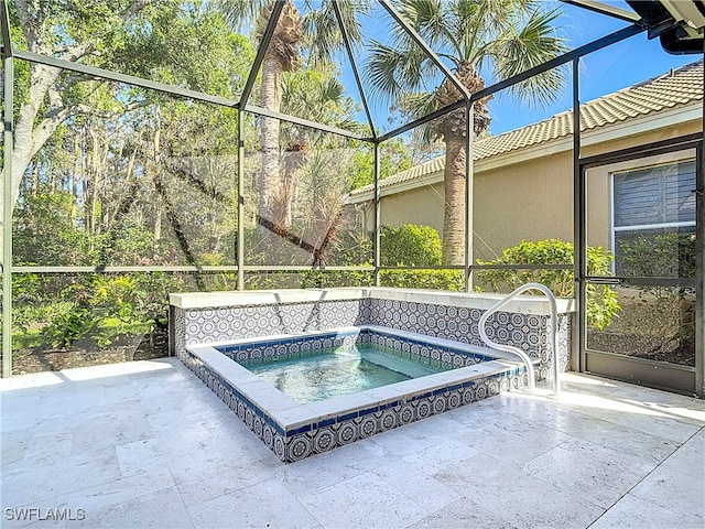 view of swimming pool featuring an in ground hot tub