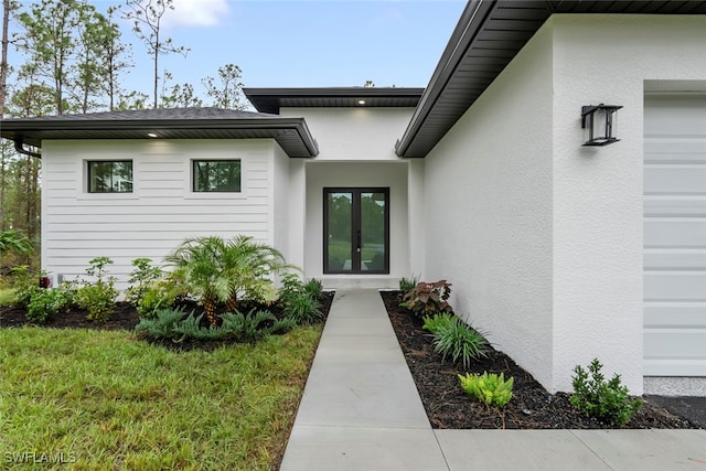 view of exterior entry with french doors