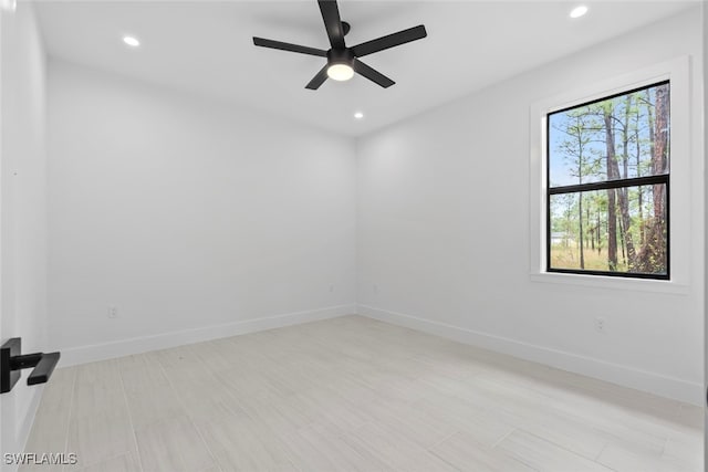 empty room featuring ceiling fan