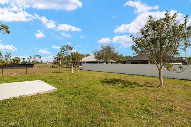 view of yard featuring fence