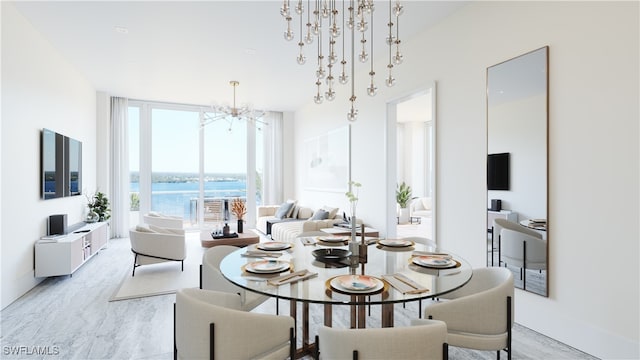 dining room with a chandelier and light hardwood / wood-style floors