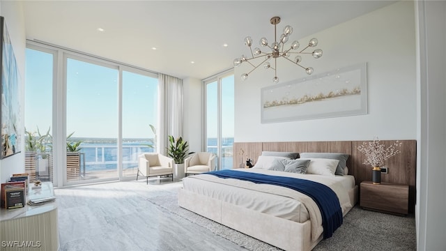 carpeted bedroom featuring access to outside, floor to ceiling windows, a water view, and a notable chandelier