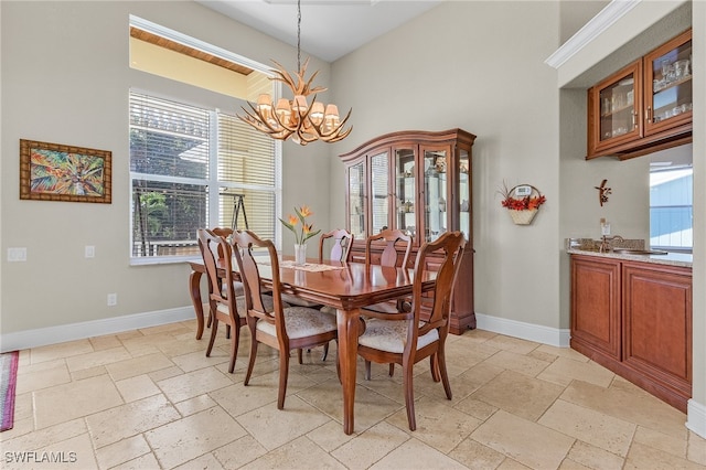 dining room featuring a notable chandelier