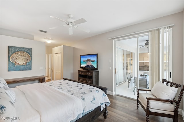 bedroom featuring access to outside, ceiling fan, a closet, and wood-type flooring