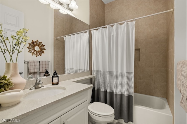 full bathroom featuring shower / tub combo, vanity, and toilet