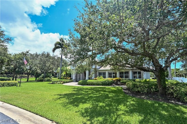 view of front of home with a front yard