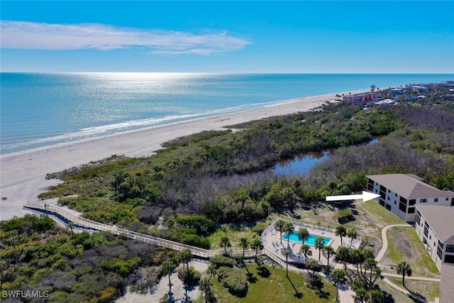 bird's eye view with a beach view and a water view