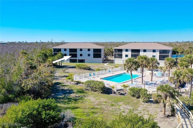 view of swimming pool with a patio