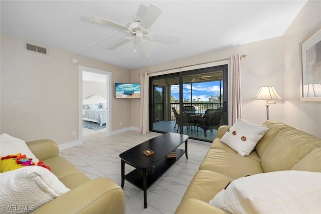 living room featuring ceiling fan