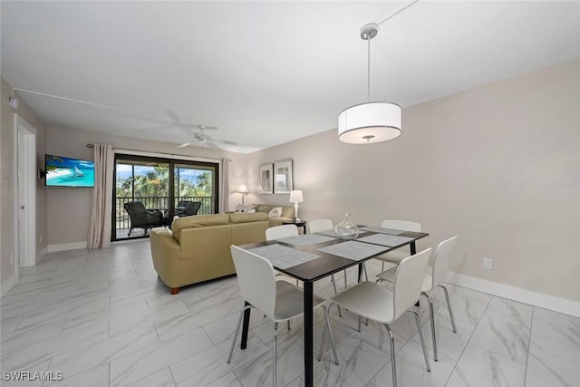 dining area with ceiling fan