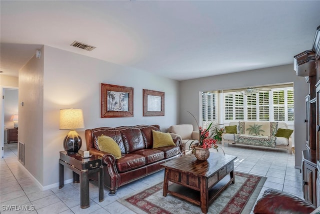 living room featuring light tile patterned flooring