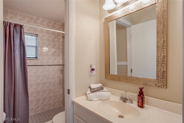 bathroom with a shower with curtain, vanity, and toilet