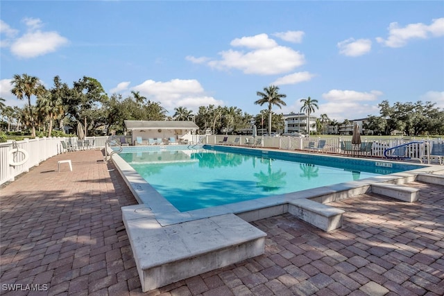 view of pool featuring a patio